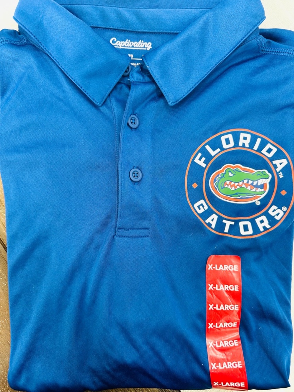 NWT Florida Gators XL Blue Polo Shirt with Team Crest in Circle logo